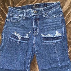 Dark denim, cropped, high wasted jeans.